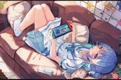 Rule 34 | 1girl, aqua hair, belt, belt buckle, blue eyes, blue hair, blue ribbon, blush, buckle, collarbone, colored inner hair, couch, dress, feet, food, food in mouth, frilled dress, frills, hair bun, highres, holding, hololive, hoshimachi suisei, hoshimachi suisei (school uniform), indoors, knees up, lying, miakiuehashi, mobile, mouth hold, multicolored hair, nintendo switch, no shoes, on back, on couch, pillow, pocky, ribbon, sailor collar, sailor dress, short sleeves, side bun, single side bun, socks, solo, two-tone hair, virtual youtuber, white dress, white sailor collar, white socks