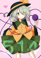 Rule 34 | 1girl, absurdres, black hat, blouse, buttons, closed mouth, collared shirt, commentary request, diamond button, eyeball, eyes visible through hair, feet out of frame, flat chest, floral print, frilled shirt collar, frilled sleeves, frills, fugaku (miko no miyatsuguchi), green eyes, green hair, green skirt, hair between eyes, hat, hat ribbon, heart, heart of string, highres, koishi day, komeiji koishi, long sleeves, medium hair, pink background, ribbon, rose print, shirt, skirt, smile, solo, third eye, touhou, wide sleeves, yellow ribbon, yellow shirt