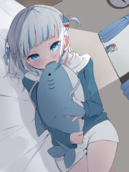 Rule 34 | 1girl, adapted costume, bedroom, biting, bloop (gawr gura), blue eyes, blue hair, blue hoodie, blunt bangs, blush, choppy bangs, commentary request, dutch angle, fang, gawr gura, gawr gura (1st costume), grey hair, highres, hololive, hololive english, hood, hood down, hoodie, indoors, long sleeves, looking at viewer, lying, medium hair, multicolored hair, on bed, on side, open mouth, shorts, skin fang, solo, streaked hair, stuffed animal, stuffed shark, stuffed toy, two side up, uica, virtual youtuber, white shorts