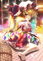 Rule 34 | 1girl, absurdres, barefoot, blonde hair, blurry, blurry background, cage, crystal, dfra, flandre scarlet, full body, hat, hat ribbon, highres, long hair, looking at viewer, mob cap, one side up, open mouth, red eyes, red ribbon, red skirt, ribbon, short sleeves, sitting, skirt, solo, touhou, wariza, white hat, wings