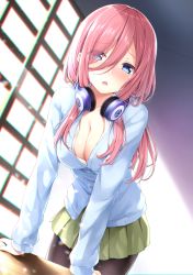 Rule 34 | 1girl, black pantyhose, blue cardigan, blue eyes, blush, breasts, cardigan, chromatic aberration, cleavage, commentary request, curtains, eyes visible through hair, go-toubun no hanayome, green skirt, hair between eyes, hair over one eye, headphones, headphones around neck, indoors, karutamo, large breasts, leaning forward, light particles, long hair, long sleeves, looking at viewer, nakano miku, open mouth, pantyhose, pink hair, pleated skirt, shirt, skirt, solo, white shirt, window