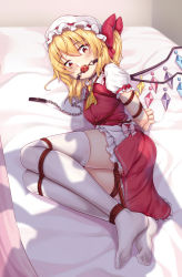 Rule 34 | 1girl, arms behind back, ascot, ball gag, bdsm, bed sheet, blonde hair, bondage, bound, bound ankles, bound arms, chain, collar, flandre scarlet, full body, gag, gagged, hat, looking at viewer, lying, mob cap, no shoes, on bed, on side, puffy short sleeves, puffy sleeves, red eyes, red skirt, red vest, shadow, shirt, short sleeves, skirt, skirt set, solo, thighhighs, touhou, vest, white hat, white shirt, white thighhighs, wiffle gag, yellow ascot, yiduan zhu