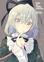 Rule 34 | 1girl, black hat, black ribbon, chinese commentary, closed mouth, commentary request, dress, english text, frilled shirt collar, frilled sleeves, frills, green eyes, green hair, grey background, hair between eyes, hat, highres, ko kita, long sleeves, looking at viewer, ribbon, short hair, simple background, soga no tojiko, solo, string, string around finger, string of fate, touhou, upper body