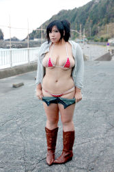 Rule 34 | 1girl, asian, bikini, black hair, boots, breasts, chouzuki maryou, cowboy boots, highres, hip focus, hood, hooded jacket, jacket, large breasts, open clothes, photo (medium), plump, side ponytail, solo, swimsuit, thick thighs, thighs, undressing, wide hips