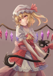 Rule 34 | 1girl, ascot, blonde hair, brown background, closed mouth, cowboy shot, crystal, fall (5754478), fang, flandre scarlet, hat, hat ribbon, highres, holding, laevatein (touhou), looking to the side, mob cap, one side up, petticoat, puffy short sleeves, puffy sleeves, red eyes, red ribbon, red vest, ribbon, shirt, short sleeves, simple background, smile, solo, standing, touhou, vest, white hat, white shirt, wings, yellow ascot
