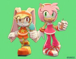 Rule 34 | 2girls, amy rose, artist name, caruel art, cream the rabbit, food, furry, furry female, gloves, green background, highres, holding, holding food, ice cream, multiple girls, open mouth, orange shirt, orange shorts, pants, pink pants, pink shirt, shirt, shoes, shorts, simple background, sleeveless, sonic (series), tongue, tongue out, watermark, white gloves