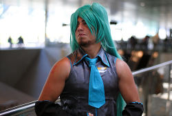 Rule 34 | 1boy, aqua hair, beard, cosplay, crossdressing, detached sleeves, facial hair, hatsune miku, long hair, lowres, male focus, necktie, photo (medium), twintails, vocaloid, wig