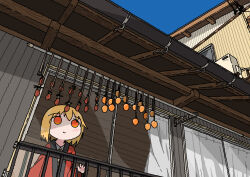 1girl absurdres balcony blonde_hair building closed_mouth coat day dried_fruit emesan_desu food fruit highres orange_eyes original persimmon railing red_coat scenery smile solo tareme window