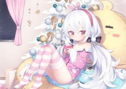 Rule 34 | 1girl, animal ears, azur lane, bag, breasts, christmas, christmas ornaments, christmas tree, cleavage, closed mouth, commentary request, cup, curtains, hair between eyes, hairband, highres, holding, holding cup, indoors, knees up, kokone (coconeeeco), laffey (azur lane), laffey (sleep to clean another day) (azur lane), long hair, long sleeves, looking at viewer, low twintails, manjuu (azur lane), meowfficer (azur lane), no shoes, off shoulder, pajamas, paper bag, pink pajamas, pink shirt, polka dot, polka dot pajamas, polka dot shirt, rabbit ears, red eyes, red hairband, shirt, sleeves past wrists, small breasts, solo, striped clothes, striped legwear, striped thighhighs, thighhighs, twintails, very long hair, white hair, wide sleeves, window