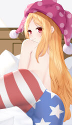 1girl absurdres american_flag_legwear ass bed blonde_hair blush clownpiece from_behind hat highres jester_cap kakokyuu_hiffuu long_hair looking_at_viewer looking_back pantyhose red_eyes smile solo topless touhou