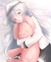 Rule 34 | 10s, 1girl, absurdres, black skirt, blue eyes, hammer and sickle, hat, hibiki (kancolle), highres, holding, holding stuffed toy, hugging doll, hugging object, kantai collection, long hair, looking at viewer, lying, maosame, on bed, one eye closed, open mouth, pleated skirt, silver hair, skirt, solo, star (symbol), stuffed animal, stuffed rabbit, stuffed toy, thighhighs, verniy (kancolle), zettai ryouiki