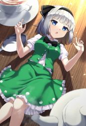 Rule 34 | 1girl, black hairband, black ribbon, blue eyes, blush, buttons, collared shirt, cup, feet out of frame, frilled skirt, frills, green skirt, green vest, hair ribbon, hairband, highres, konpaku youmu, mini person, minigirl, open mouth, puffy short sleeves, puffy sleeves, ribbon, shirt, short hair, short sleeves, skirt, solo, spoon, touhou, vest, white hair, white shirt, yosshy