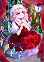 Rule 34 | 1girl, ascot, bat wings, blonde hair, crystal, flandre scarlet, hat, hat ribbon, inukkomaru, kneeling, lamp, mob cap, multicolored wings, one side up, own hands together, plant, potted plant, puffy short sleeves, puffy sleeves, red eyes, red skirt, red vest, ribbon, short sleeves, side ponytail, skirt, skirt set, solo, suzushina, touhou, vest, white hat, wings, yellow ascot
