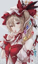 Rule 34 | 1girl, absurdres, blonde hair, closed mouth, expressionless, flandre scarlet, floral background, gothic lolita, grey background, hair ornament, hat, highres, lolita fashion, looking at viewer, mob cap, off shoulder, red eyes, red nails, shirt, short hair, solo, torinari (dtvisu), touhou, white shirt
