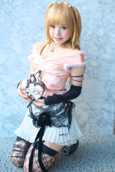 Rule 34 | 1girl, amane misa, amane misa (cosplay), asian, bare shoulders, blonde hair, breasts, choker, color contacts, cosplay, cross, death note, fingerless gloves, garter straps, gloves, hair ornament, highres, indoors, jewelry, kipi-san, kneeling, long hair, looking at viewer, miniskirt, mole, pendant, photo (medium), ring, single glove, skirt, skull and crossbones, skull hair ornament, skull ring, small breasts, smile, solo, thighhighs, two side up, zettai ryouiki