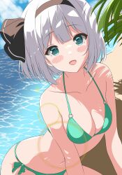 Rule 34 | 1girl, beach, bikini, black hairband, blue sky, blush, breasts, cleavage, cloud, commentary, green bikini, green eyes, grey hair, hairband, highres, konpaku youmu, looking at viewer, medium breasts, navel, ocean, open mouth, outdoors, setsugetsuka436, short hair, sky, solo, swimsuit, touhou, white hair