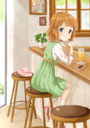 Rule 34 | 1girl, bar stool, blue eyes, blush, cellphone, commentary request, cup, dress, drinking glass, full body, green dress, idolmaster, idolmaster million live!, indoors, light brown hair, long sleeves, looking at viewer, mugi (banban53), phone, plant, potted plant, short hair, sitting, sleeveless, sleeveless dress, solo, stool, suou momoko, undershirt, window