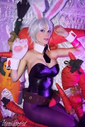 Rule 34 | 1girl, adami langley, animal ears, carrot, cosplay, league of legends, leotard, looking at viewer, lying, nail polish, pantyhose, photo (medium), playboy bunny, riven (league of legends), short hair, white hair