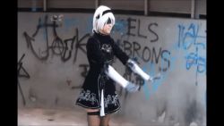 Rule 34 | 2girls, a2 (nier:automata) (cosplay), animated, animated gif, blindfold, cosplay, long hair, lowres, multiple girls, nier, nier:automata, nier (series), photo (medium), short hair, slapping, thighhighs, white hair, 2b (nier:automata), 2b (nier:automata) (cosplay), a2 (nier:automata)