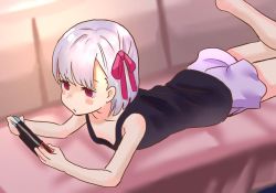 Rule 34 | 1girl, bare arms, black shirt, blush stickers, couch, fate/grand order, fate (series), hair ornament, hair ribbon, jitome, kama (fate), leg up, lying, nintendo switch, on couch, on stomach, pink eyes, playing games, purple shorts, ribbon, shirt, short hair, shorts, simple background, white hair, zenshin