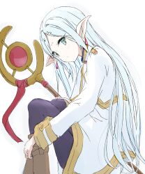 Rule 34 | 1girl, closed mouth, commentary request, core (mayomayo), dress, earrings, elf, frieren, green eyes, hair down, highres, holding, holding staff, jewelry, looking at viewer, mage staff, pointy ears, simple background, sitting, solo, sousou no frieren, staff, white background, white dress, white hair, wizard
