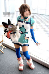 Rule 34 | 1girl, asian, blue gloves, blue thighhighs, branky, breasts, brown eyes, brown hair, cosplay, elbow gloves, fingerless gloves, gensou suikoden, gloves, indoors, kipi-san, looking at viewer, mel, mel (cosplay), photo (medium), puppet, short hair, small breasts, stuffed animal, stuffed toy, thighhighs, zettai ryouiki
