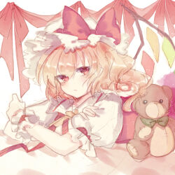 Rule 34 | 1girl, ascot, blonde hair, closed mouth, crystal wings, flandre scarlet, hat, hat ribbon, looking at viewer, mob cap, on bed, puffy short sleeves, puffy sleeves, red eyes, red ribbon, ribbon, short sleeves, side ponytail, solo, sorani (kaeru0768), stuffed animal, stuffed toy, teddy bear, touhou, upper body, yellow ascot