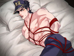 Rule 34 | 1boy, arms behind back, bdsm, black hair, blue eyes, bound, bound arms, hat, jojo no kimyou na bouken, kuujou joutarou, less end, male focus, muscular, muscular male, on bed, pillow, shibari, shibari over clothes, solo, stardust crusaders, topless male