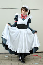 Rule 34 | 1girl, apron, black dress, black footwear, bow, brown hair, cosplay, dress, full body, head tilt, holding, konatsu minato, large bow, long sleeves, looking at viewer, maid, maid apron, outdoors, photo (medium), red bow, shoes, short hair, short twintails, sleeves past wrists, solo, standing, twintails, white legwear