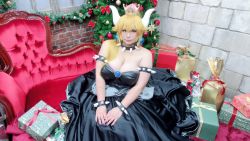 Rule 34 | 1girl, armlet, asian, bare shoulders, black collar, black dress, black nails, blonde hair, blue eyes, borrowed design, bowsette, bowsette (cosplay), bracelet, breasts, brooch, chouzuki maryou, cleavage, collar, cosplay, crown, dress, earrings, fingernails, horns, jewelry, large breasts, long hair, looking at viewer, mario (series), nail polish, new super mario bros. u deluxe, nintendo, photo (medium), plump, shell, skirt, smile, solo, spiked armlet, spiked bracelet, spiked collar, spiked shell, spikes, standing, strapless, strapless dress, super crown, turtle shell