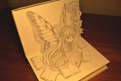 Rule 34 | 1girl, amano sakuya, book, butterfly wings, copyright name, gosick, greyscale, hairband, holding, holding smoking pipe, insect wings, juliet sleeves, kneeling, lolita fashion, lolita hairband, long hair, long sleeves, monochrome, on ground, papercraft (medium), photo (medium), puffy sleeves, smoking pipe, solo, traditional media, turning page, unconventional media, very long hair, victorica de blois, wings
