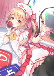 Rule 34 | 1girl, absurdres, alternate costume, apple, ascot, black pantyhose, blonde hair, blurry, blurry foreground, bow, crystal, depth of field, flandre scarlet, food, frills, fruit, hair bow, hat, heart, highres, holding, holding food, holding fruit, huge filesize, indoors, licking, long hair, looking at viewer, looking back, lying, monitor, nurse, nurse cap, on stomach, open mouth, pantyhose, pillow, pink bow, power-up, red eyes, short sleeves, side ponytail, skirt, smile, solo, syringe, thighhighs, topia, touhou, white hat, white skirt, wings, wrist cuffs, yellow ascot