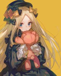 Rule 34 | 1girl, abigail williams (fate), black bow, black dress, black headwear, blonde hair, blue eyes, blush, bow, chocoan, dress, fate/grand order, fate (series), forehead, hair bow, long hair, long sleeves, looking at viewer, multiple hair bows, orange bow, parted bangs, polka dot, polka dot bow, simple background, sleeves past fingers, sleeves past wrists, solo, stuffed animal, stuffed toy, teddy bear, yellow background