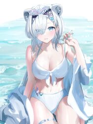 Rule 34 | 1girl, alternate costume, animal ears, arknights, aurora (arknights), bare shoulders, bear ears, bikini, blue eyes, blue nails, blush, breasts, clam, cleavage, commentary, cowboy shot, ear piercing, english commentary, hair over one eye, hairband, highres, large breasts, long hair, looking at viewer, nail polish, ocean, outdoors, parted lips, piercing, sankichi (croquette crab), sitting, solo, swimsuit, water, white bikini, white hair
