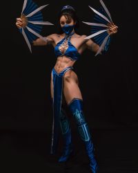 Rule 34 | 1girl, abs, armpits, arms up, black background, black eyes, black hair, boots, breasts, chinese (nationality), cleavage, clothes, cosplay, cosplay photo, fang, fangs, female focus, full body, halterneck, highres, holding, holding weapon, kitana, kitana (cosplay), looking at viewer, mask, medium breasts, midriff, model, mortal kombat (series), mouth mask, muscular, muscular arms, muscular female, muscular legs, navel, photo (medium), ponytail, real life, simple background, solo, standing, thigh boots, war fan, weapon, yuan herong