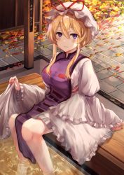 Rule 34 | 1girl, ashiyu, autumn leaves, blonde hair, blush, breasts, commentary, commentary request, fingernails, hair between eyes, hat, hat ribbon, highres, juliet sleeves, large breasts, leaf, light smile, long sleeves, looking at viewer, maple leaf, mob cap, nail polish, parted lips, puffy sleeves, purple eyes, red nails, red ribbon, ribbon, sharp fingernails, short hair, sidelocks, sitting, soaking feet, solo, symbol-only commentary, tabard, torottye, touhou, water, white hat, wide sleeves, yakumo yukari