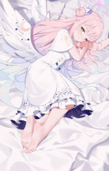 Rule 34 | 1girl, absurdres, barefoot, bed sheet, bingchuan xian yu huang, blue archive, closed mouth, dress, frilled dress, frills, full body, hair bun, halo, highres, lying, mika (blue archive), on bed, on side, pink hair, short sleeves, single side bun, smile, solo, white dress, white wings, wings, yellow eyes