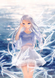 Rule 34 | 1girl, blouse, blue eyes, blue shirt, blush, collarbone, day, floating hair, hair ornament, hand in own hair, hand up, heart, heart print, highres, long hair, looking at viewer, mimosa, ocean, original, outdoors, parted lips, see-through, shirt, short sleeves, silver hair, skirt, solo, standing, white skirt