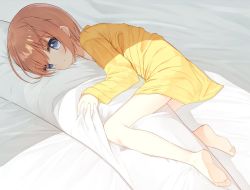 Rule 34 | 1girl, barefoot, bed sheet, blush, body pillow, brown hair, closed mouth, commentary request, grey hair, long sleeves, lucena winter, lying, hugging object, on side, original, pillow, pillow hug, shirt, sleeves past wrists, soles, solo, yellow shirt, yuuhagi (amaretto-no-natsu)