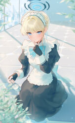 Rule 34 | 1girl, absurdres, apron, black dress, black gloves, blonde hair, blue archive, blue bow, blue bowtie, blue eyes, blurry, blush, bottle, bow, bowtie, closed mouth, commentary, depth of field, dress, eshineko, fingerless gloves, frilled apron, frills, gloves, hair bun, hand up, highres, holding, holding bottle, indoors, juliet sleeves, long sleeves, looking at viewer, maid apron, maid headdress, plant, puffy sleeves, single hair bun, solo, squatting, symbol-only commentary, toki (blue archive), v over mouth, white apron, white headdress, white headwear