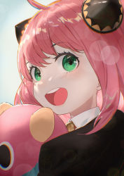 Rule 34 | 1girl, :o, anya (spy x family), black jacket, blouse, blush, child, collared shirt, director chimera (spy x family), green eyes, highres, holding, holding stuffed toy, horn ornament, horns, jacket, looking at viewer, looking back, open mouth, pink hair, salmon88, shirt, simple background, solo, spy x family, stuffed animal, stuffed toy, teeth, upper teeth only, white shirt