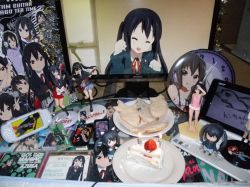 Rule 34 | 1girl, 2d dating, birthday, black hair, cake, cd, cellphone, clock, computer, figure, food, game, handheld game console, highres, k-on!, keyboard (computer), lonely, long hair, monitor, nakano azusa, nendoroid, paw pose, phone, photo (medium), playstation portable, school uniform, smile, taiyaki, twintails, wagashi