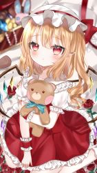 Rule 34 | 1girl, blurry, blurry background, blush, closed mouth, crystal, expressionless, flandre scarlet, flower, foot out of frame, frilled shirt collar, frills, from above, hair between eyes, hat, hat ribbon, highres, holding, holding stuffed toy, indoors, jewelry, looking at viewer, medium hair, mob cap, okome2028, on bed, one side up, petticoat, pointy ears, puffy short sleeves, puffy sleeves, red eyes, red flower, red ribbon, red rose, red skirt, red vest, ribbon, rose, short sleeves, sitting, skirt, solo, stuffed animal, stuffed toy, teddy bear, touhou, treasure chest, vest, wariza, white hat, wings, wrist cuffs