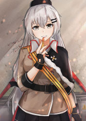 Rule 34 | 1girl, absurdres, belt, black belt, black cloak, black gloves, black hat, black skirt, breasts, brown jacket, bullet, cloak, finger to mouth, fingerless gloves, girls&#039; frontline, gloves, grey eyes, grey hair, hair ornament, hairclip, hat, highres, holding, holding bullet, jacket, jewelry, long hair, looking at viewer, low twintails, medium breasts, military hat, muteppona hito, red star, ring, simple background, skirt, solo, standing, star (symbol), svd (girls&#039; frontline), twintails, wall, weapon case, wedding band