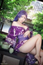 Rule 34 | 1girl, barefoot, breasts, cleavage, cosplay, fate/grand order, fate (series), feet, female focus, highres, japanese clothes, kimono, large breasts, long hair, looking at viewer, matching hair/eyes, minamoto no raikou (fate), minamoto no raikou (fate) (cosplay), no bra, outdoors, photo (medium), purple eyes, purple hair, sitting, solo, toes, yoshinobi cos, yukata