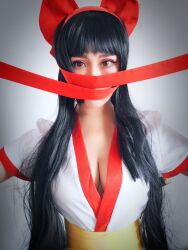 Rule 34 | 1girl, black hair, breasts, brown eyes, cleavage, cosplay, fingerless gloves, foxyini, gloves, hair ribbon, highres, large breasts, long hair, looking at viewer, looking back, nakoruru, nakoruru (cosplay), photo (medium), real life, ribbon, samurai spirits, snk, solo, the king of fighters, weapon