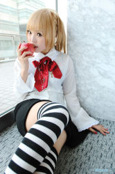 Rule 34 | 1girl, amane misa, amane misa (cosplay), apple, asian, blonde hair, breasts, cosplay, cross, cross necklace, death note, food, fruit, indoors, jewelry, kipi-san, looking at viewer, miniskirt, mole, necklace, on floor, photo (medium), sitting, skirt, small breasts, solo, striped clothes, striped thighhighs, thighhighs