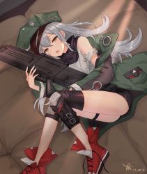 Rule 34 | 1girl, armband, assault rifle, bare shoulders, bed, brown eyes, bullpup, caseless firearm, g11 (girls&#039; frontline), girls&#039; frontline, grey hair, gun, h&amp;k g11, hair between eyes, hat, horizontal magazine, jacket, karimo/konchi, knee pads, long hair, looking at viewer, lying, hugging object, on bed, on side, open mouth, personification, prototype design, rifle, scarf, shoes, shorts, solo, tank top, thigh strap, weapon