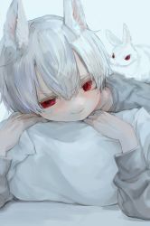 Rule 34 | 1boy, absurdres, animal, animal ears, animal on back, closed mouth, hair between eyes, highres, hzk (user kemd2843), long sleeves, looking at viewer, lying, on stomach, original, pillow, pillow grab, rabbit boy, red eyes, shirt, short hair, smile, white background, white hair
