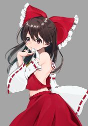 Rule 34 | 1girl, 3miril, absurdres, between fingers, black hair, bow, cowboy shot, detached sleeves, from side, grey background, hair bow, hair tubes, hakurei reimu, highres, holding, looking at viewer, medium hair, no bra, red bow, red shirt, red skirt, ribbon-trimmed sleeves, ribbon trim, shirt, simple background, skirt, solo, standing, touhou, wide sleeves